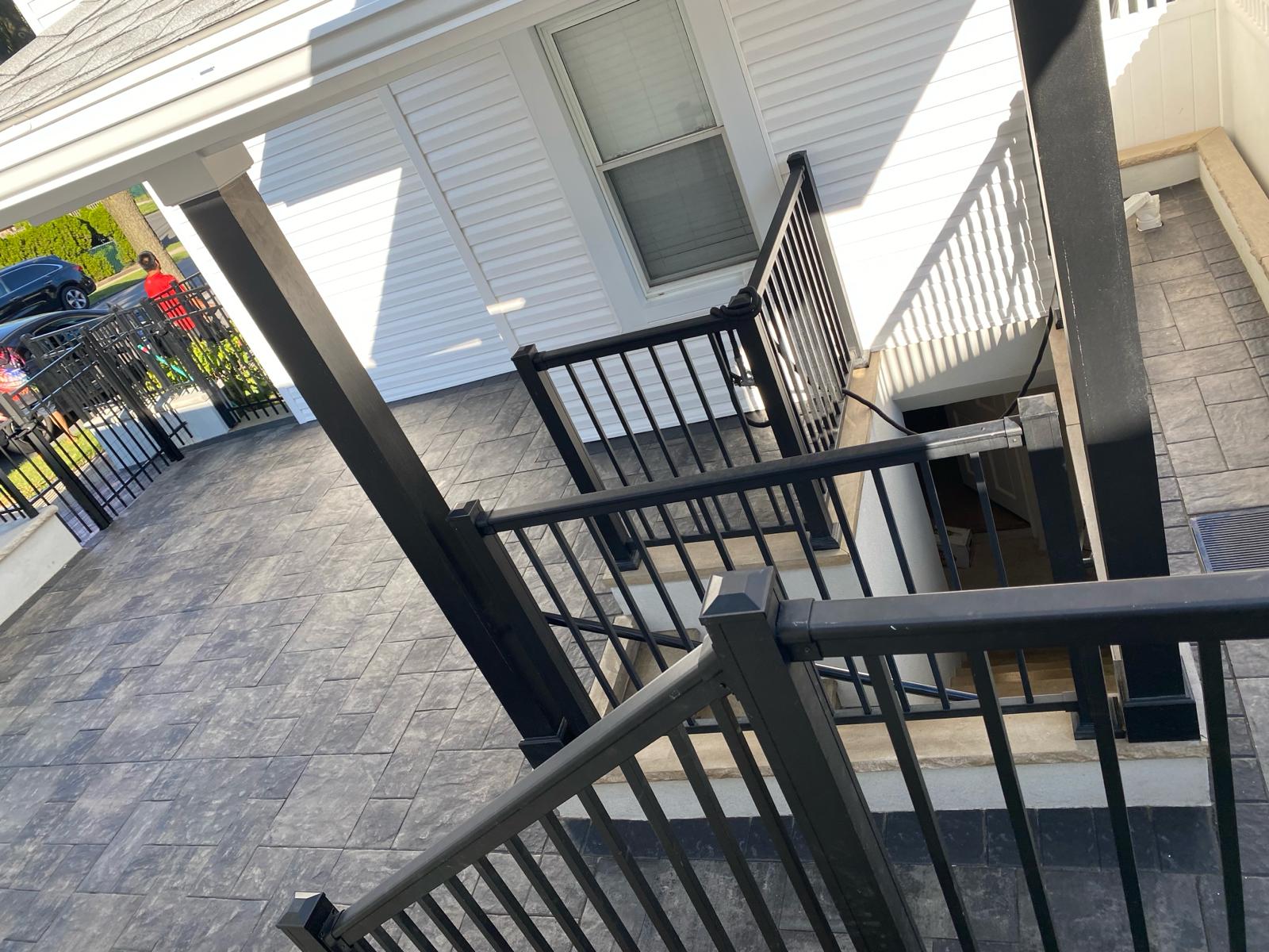 Ouside patio with black railings